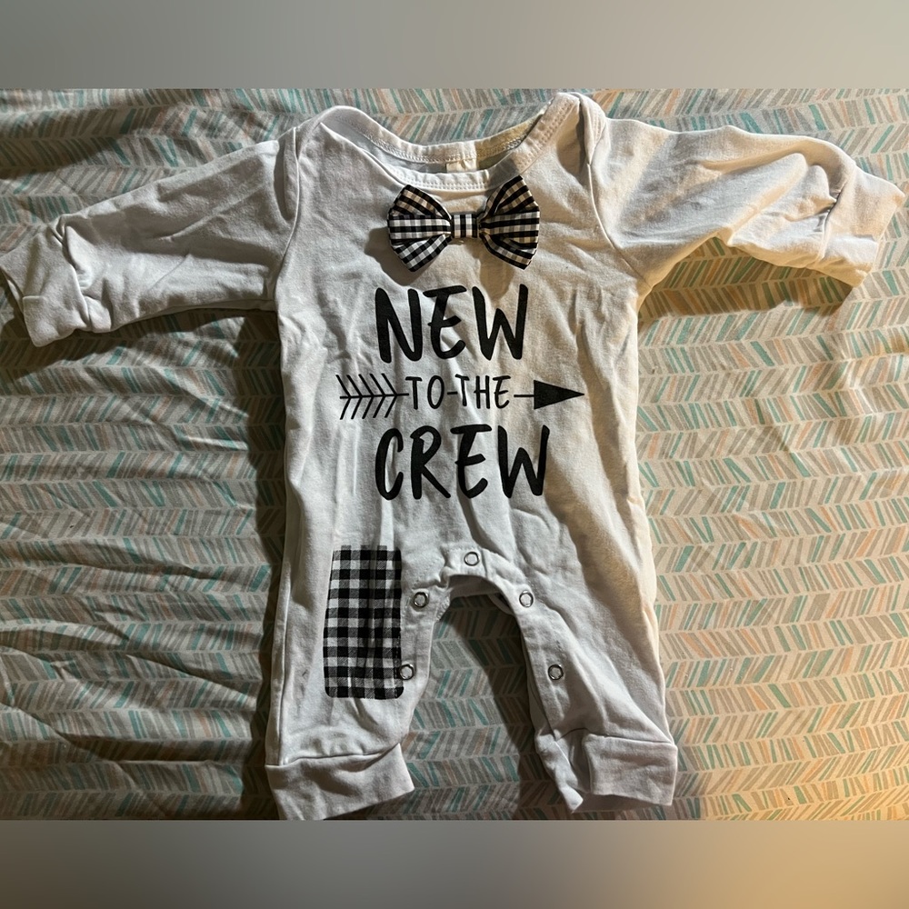 New to the crew romper. Never worn. 3-6 months